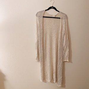 Cardigan with gray stripes.